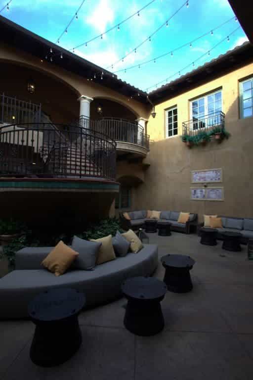 Outdoor patio at Dio Deka Restaurant with plush seating for networking events and gatherings.