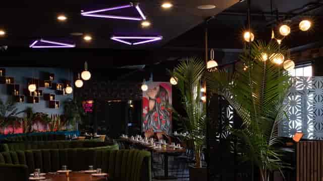 Modern Wild Rose Eatery with vibrant decor, ideal for corporate events and intimate gatherings.
