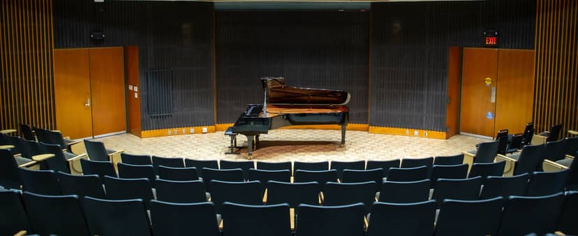 Stanford University music classroom with grand piano, ideal for concerts and recitals.