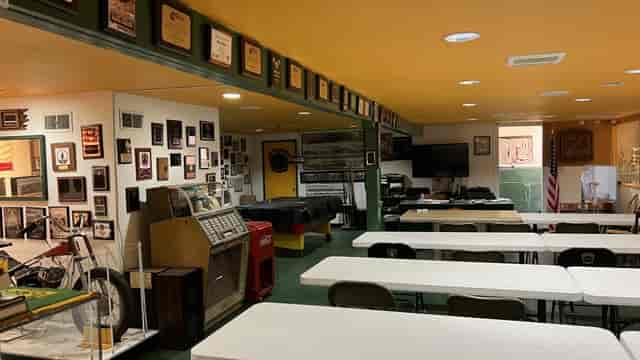 San Jose Dons Motorcycle Club event space with memorabilia, ideal for gatherings and team-building.