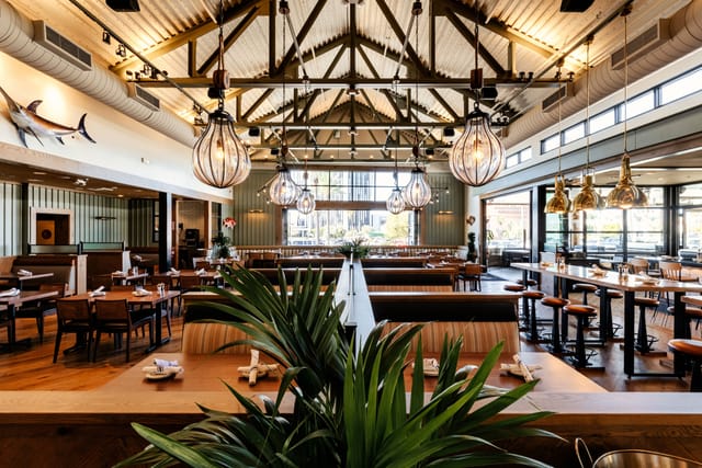 Spacious Market Broiler patio with modern decor, ideal for events and gatherings.
