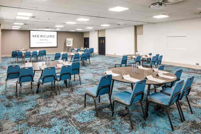 Ironbridge Suite meeting room with round tables, ideal for conferences and workshops.