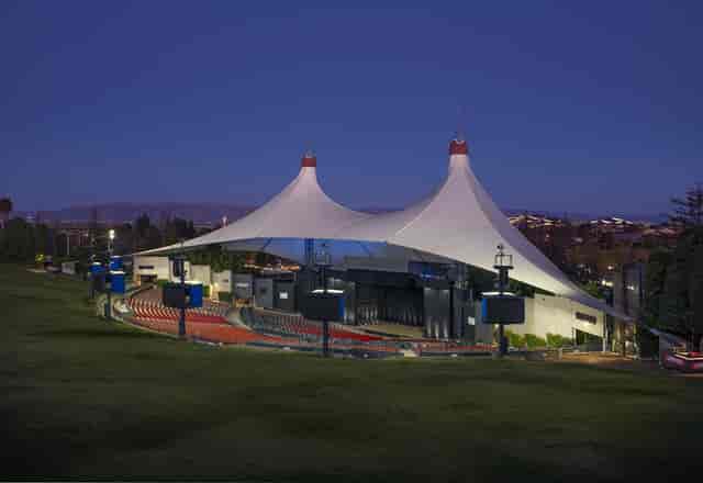 Shoreline Amphitheatre outdoor venue with tent-like structure for concerts and events.