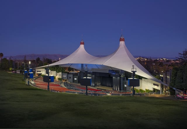 Shoreline Amphitheatre outdoor venue with tent-like structure for concerts and events.