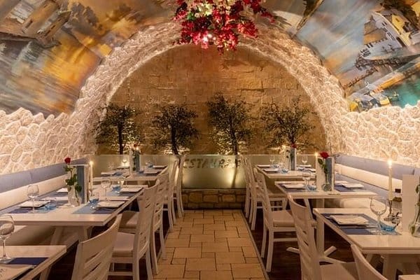 Main Dining Area at Opa! Authentic Greek with arched ceiling, ideal for events and gatherings.