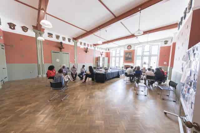 Ashbee Hall historic venue featuring flexible seating for collaborative workshops and conferences.