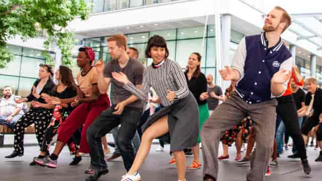 Vibrant dance class at Swing Patrol, showcasing inclusivity and engagement for events.