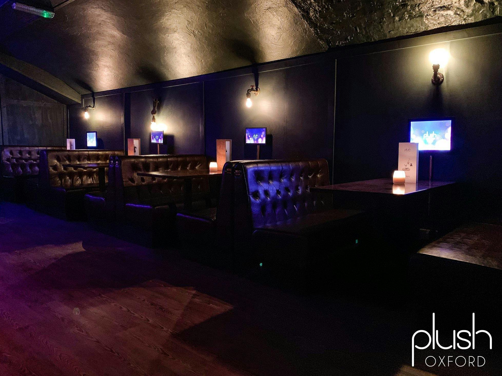 VIP area in Plush Oxford with plush seating, perfect for networking events and private gatherings.