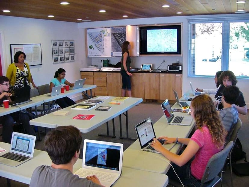Collaborative meeting space at Neutra House with tech setup for productive sessions.