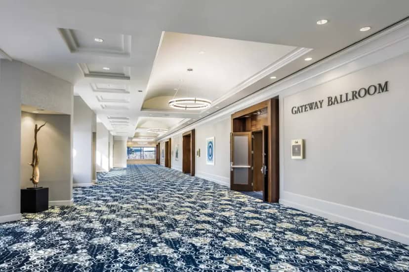 Elegant corridor leading to Gateway Ballroom at DoubleTree San Jose for events and conferences.