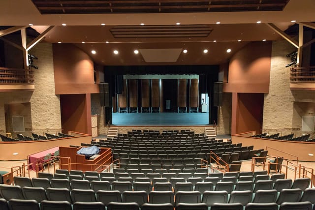 Clark Center Auditorium with tiered seating, ideal for events and meetings.