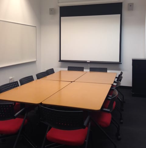 Clark Center Auditorium meeting room with ergonomic chairs, ideal for presentations and discussions.