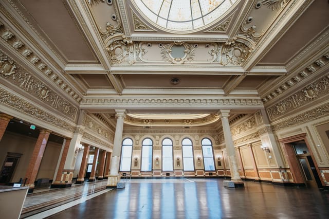 Main Hall in The Hibernia: elegant event space with high ceilings for upscale gatherings.