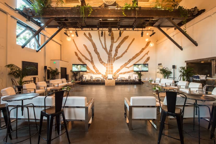 Mezzanine in The Pearl: modern event space with greenery for corporate functions and workshops.