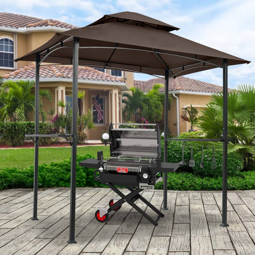 Outdoor grilling station under gazebo at The Hook Bar and Grill for casual gatherings.