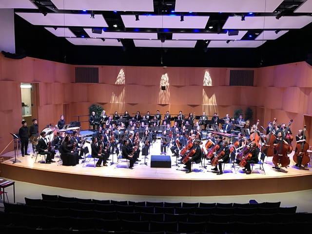 UCSC Recital Hall set for orchestral performance with optimal seating and acoustics.