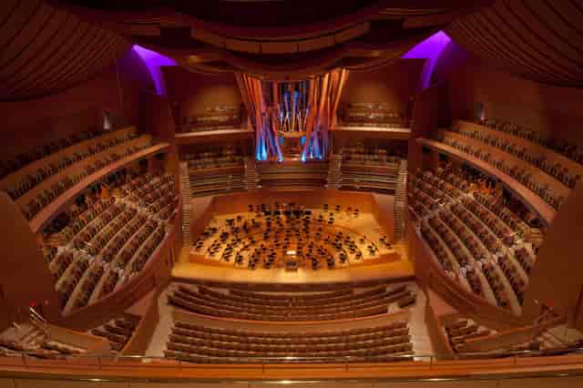 Stunning concert hall with tiered seating for concerts and corporate events.