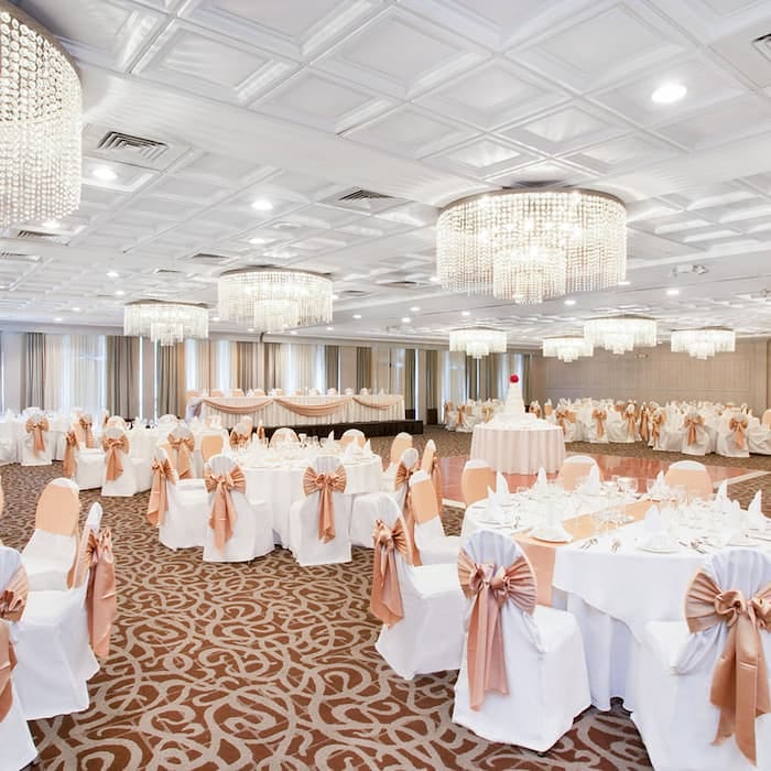 Elegant ballroom with chandeliers, ideal for weddings and formal events in San Jose.