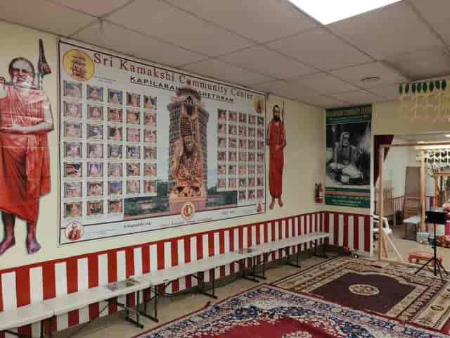 Community center with cultural mural, ideal for gatherings and events in Sri Kamakshi.