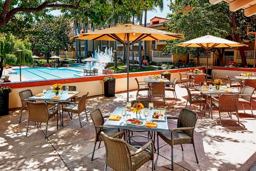 Outdoor dining area at Sheraton San Jose Hotel, perfect for events and networking lunches.
