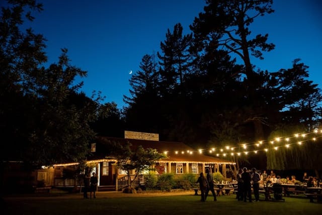 Outdoor farm tables at Radonich Ranch, perfect for evening events and gatherings.