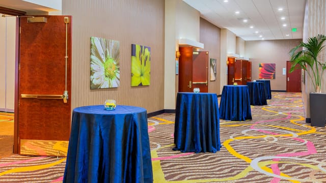 Carmel Boardroom at Holiday Inn San Jose, elegant cocktail tables for networking events.