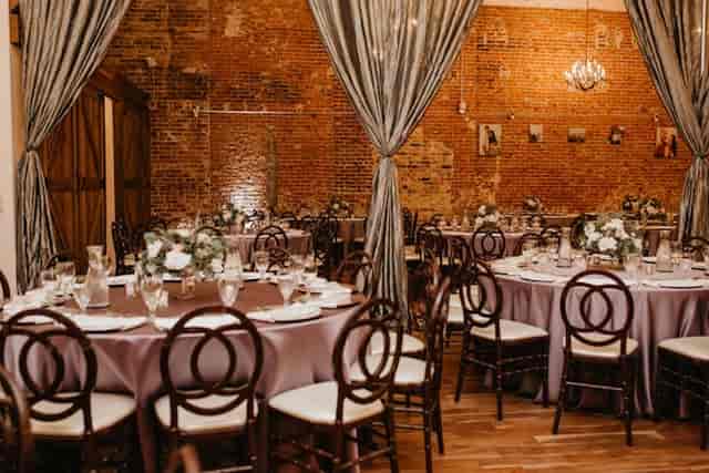 VIP Lounge at The Century with elegant lavender tables, perfect for weddings and upscale events.