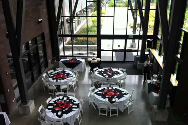 Grand Hall at Green River Conference Center with elegant round tables for events and gatherings.
