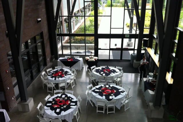 Grand Hall at Green River Conference Center with elegant round tables for events and gatherings.