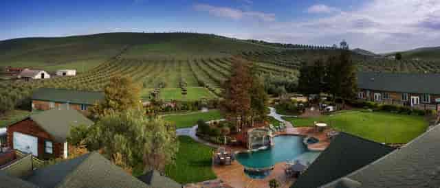 Banquet Hall at The Purple Orchid Resort, outdoor venue with vineyards for events.