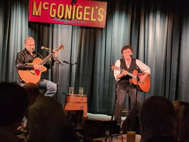 Live music performance at McGonigel's Mucky Duck, cozy atmosphere for events.