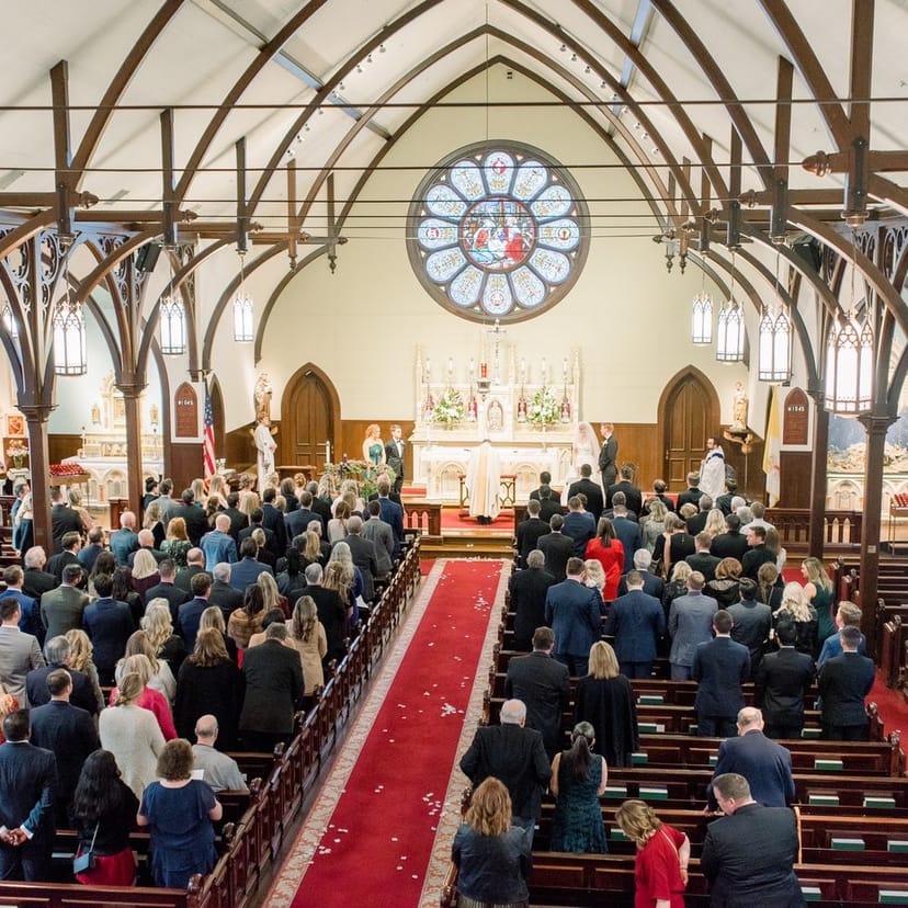 Main Sanctuary at Woodside Village Church, elegantly decorated for a wedding ceremony.