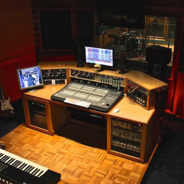 Professional audio mixing console in OTW Recording Studio for events and performances.