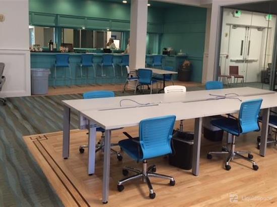 Versatile meeting space with ergonomic chairs for workshops and team meetings.