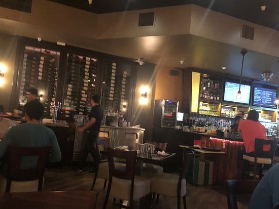 Cozy bar at The Oxford Kitchen, perfect for casual meetings and small events.