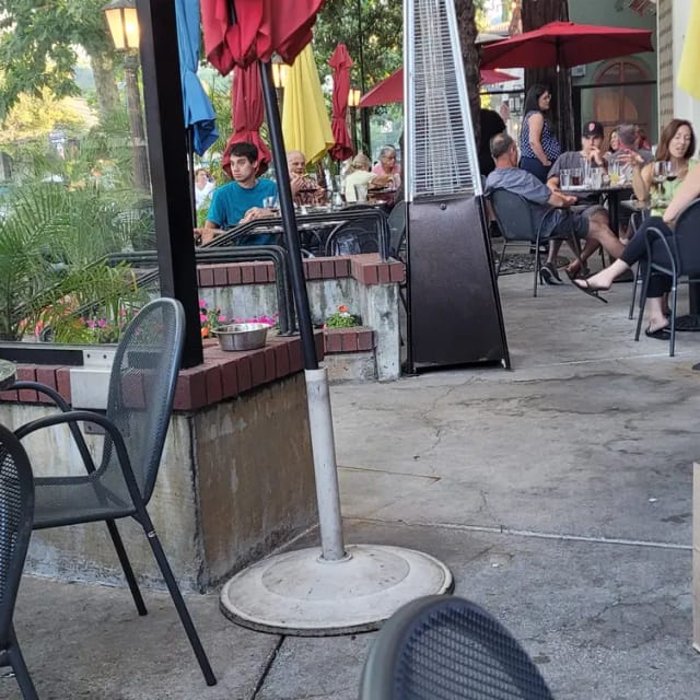 Outdoor dining patio at Willow Street Wood-Fired Pizza, perfect for networking events.