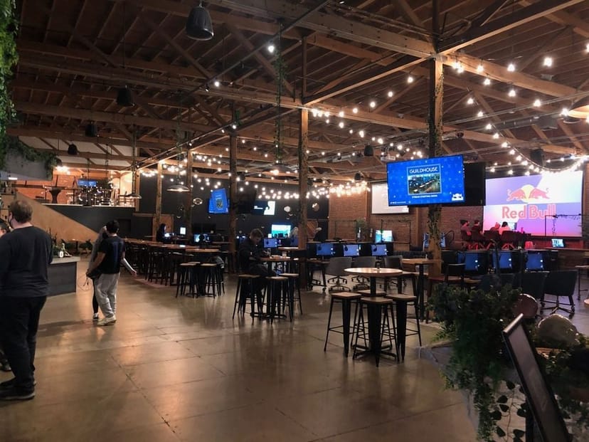Guildhouse Event Space with string lights, ideal for corporate events and social gatherings.