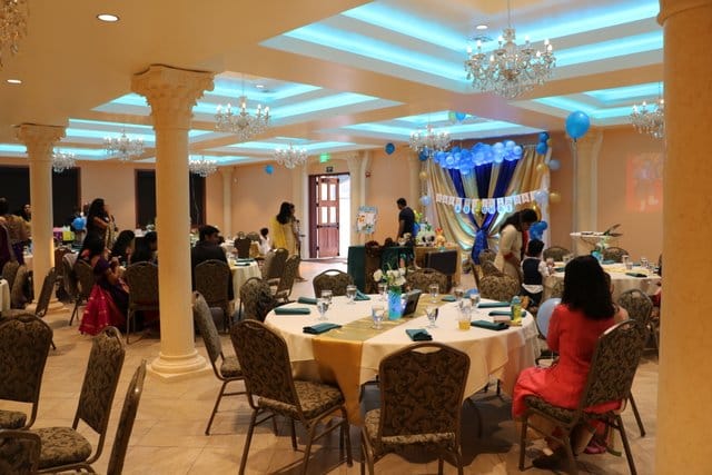 Elegant Resham Event Center with blue and gold decor for celebrations and gatherings.