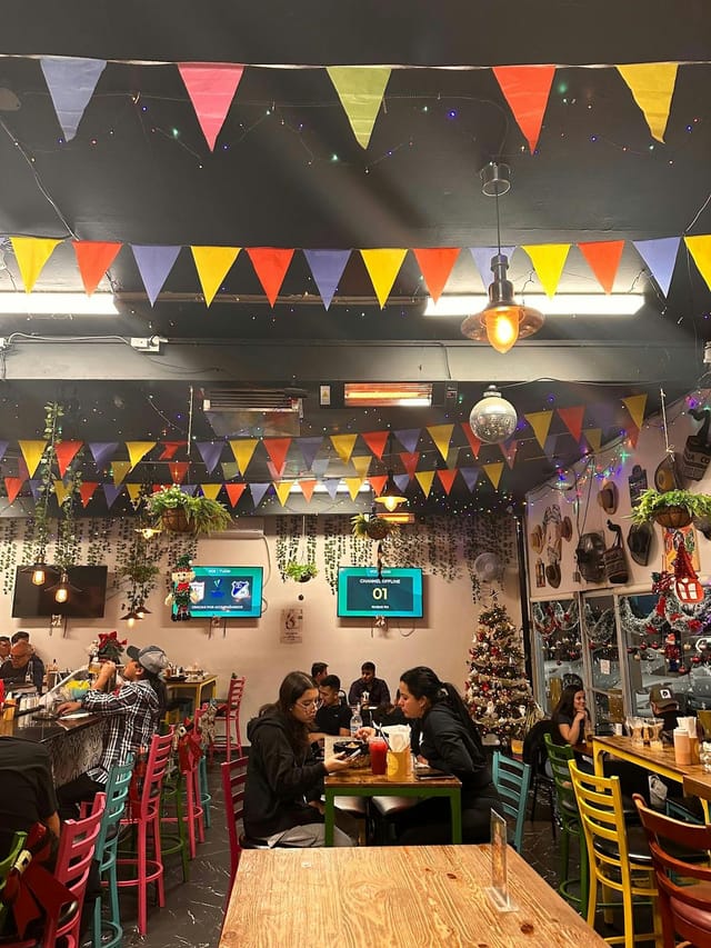 Vibrant dining space at Fonda Colombiana San Jose, ideal for casual gatherings and events.