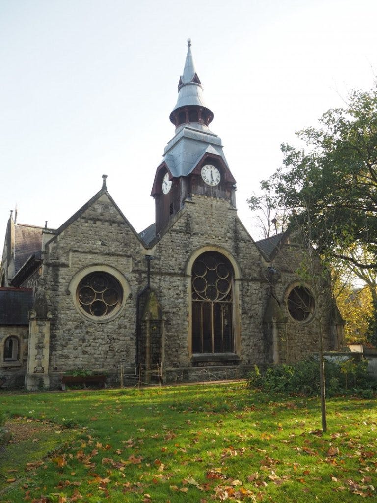 St Matthias Church with clock tower, perfect for weddings and corporate retreats.