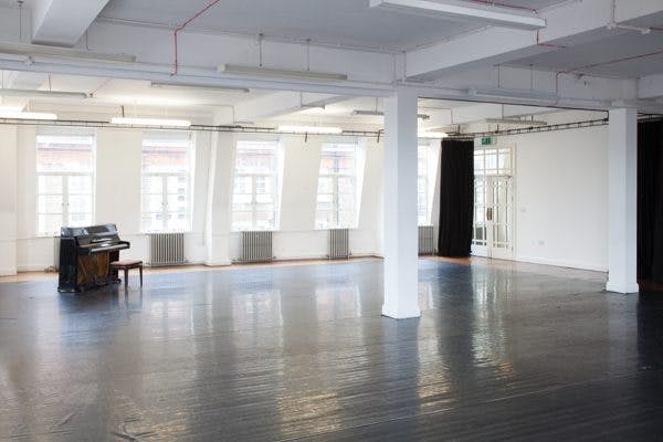 Spacious studio space with piano, ideal for meetings and creative workshops in St Matthias Halls.