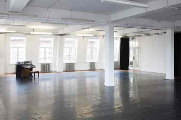 Spacious studio space with piano, ideal for meetings and creative workshops in St Matthias Halls.