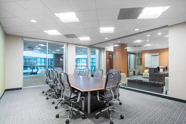 Modern conference room in Techmart Center with large table for effective meetings.