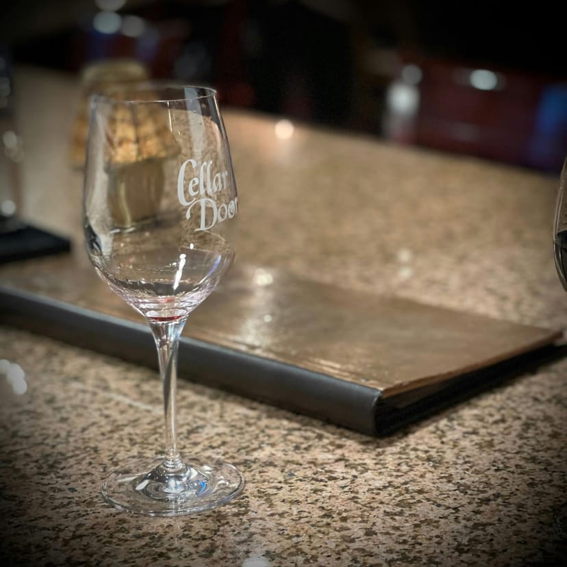 Elegant event space with wine glass, perfect for wine tastings and upscale gatherings.