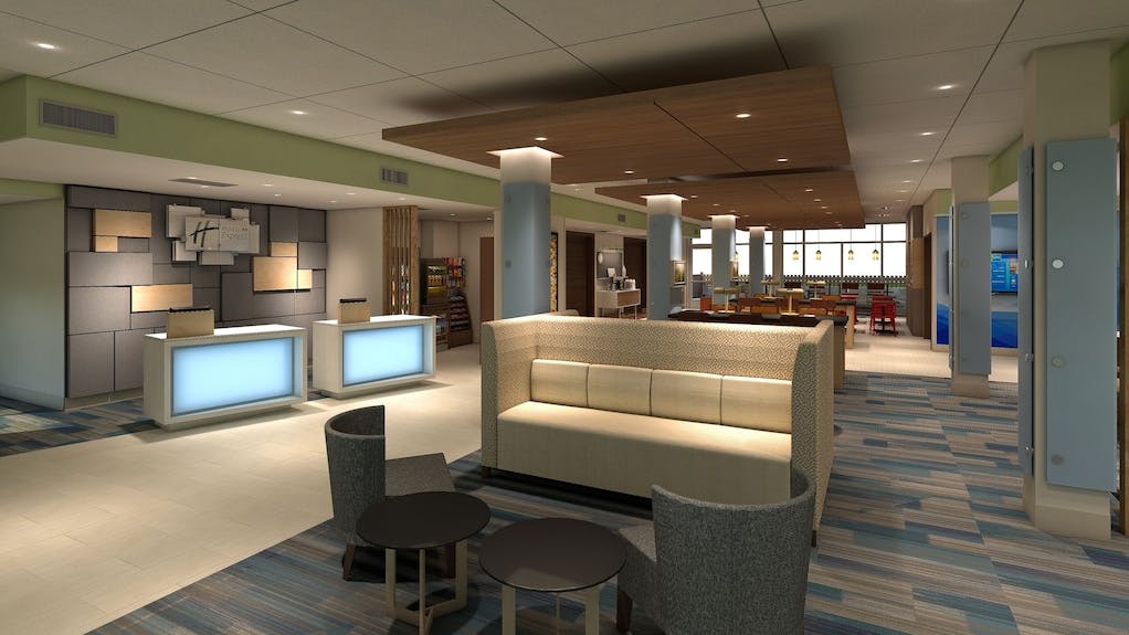 Modern lobby at Holiday Inn Express San Jose Airport, ideal for meetings and events.
