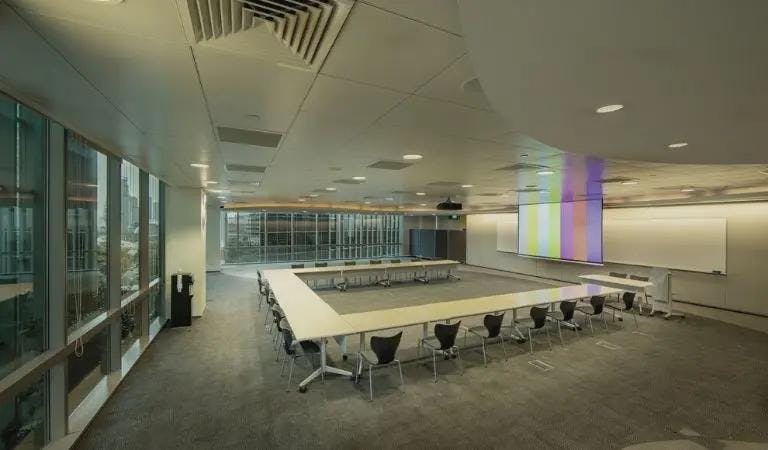 Modern meeting room in Cliftons Singapore with flexible layout for corporate workshops.