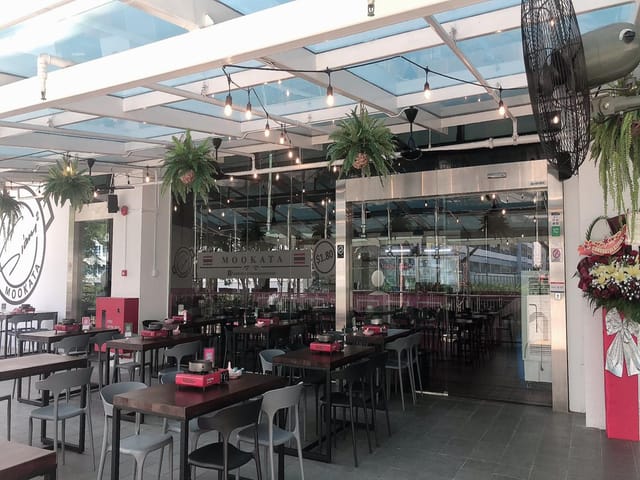 Modern dining space at Siam Square Mookata, perfect for networking events and team lunches.