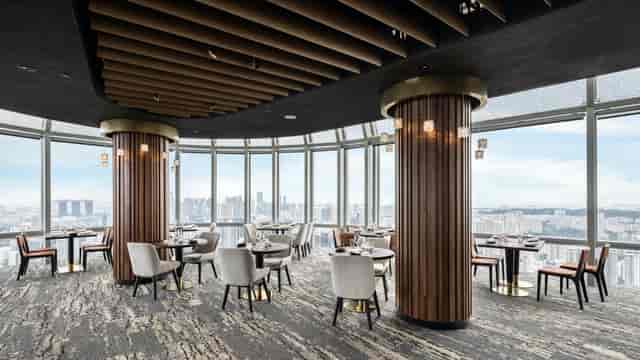 Sophisticated dining space with city views for corporate events and gatherings.