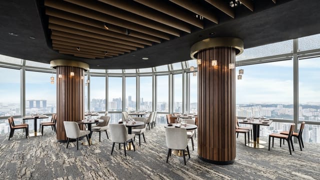 Sophisticated dining space with city views for corporate events and gatherings.