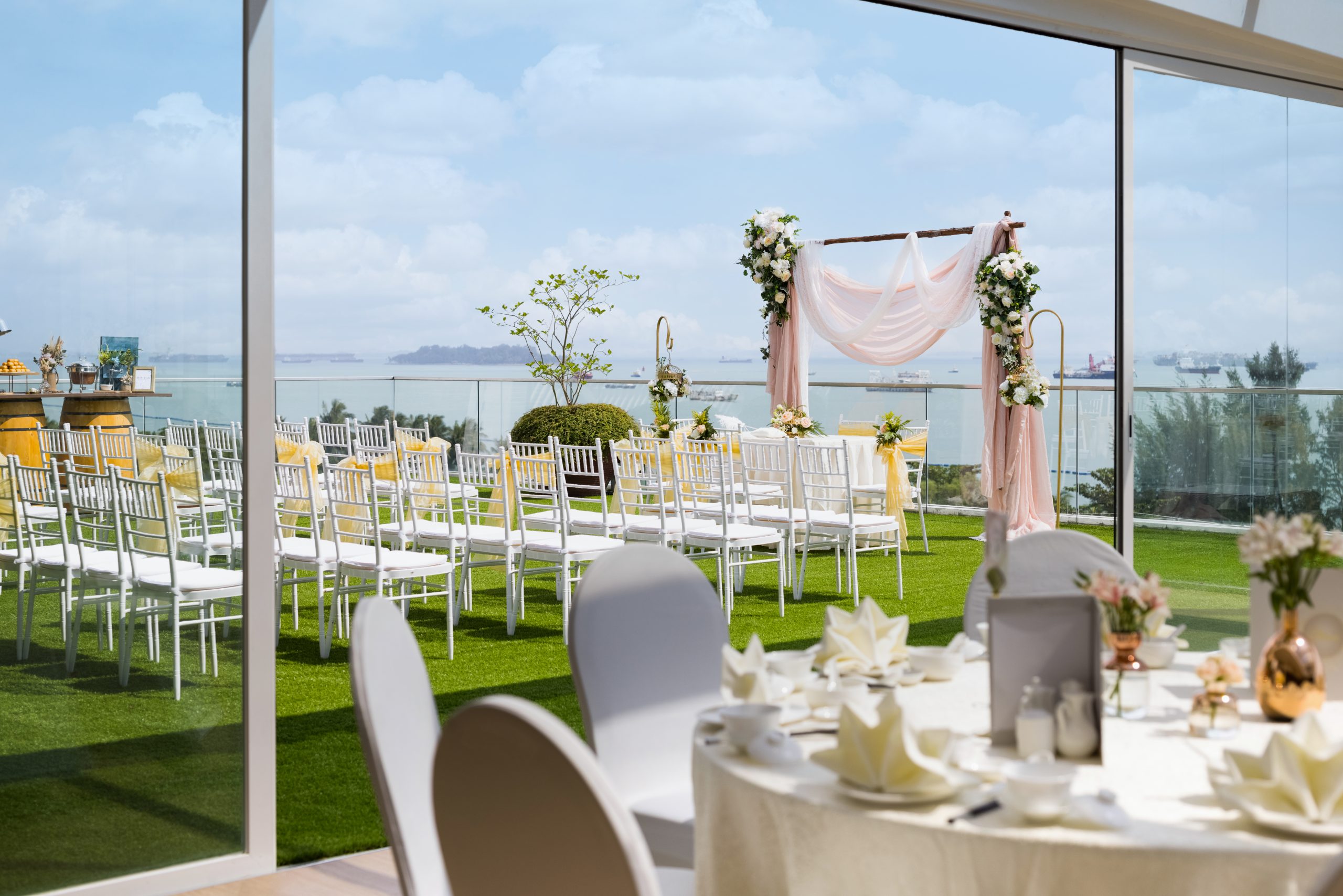 Private room at Sky Garden Sentosa, elegant outdoor wedding venue with lush greenery.